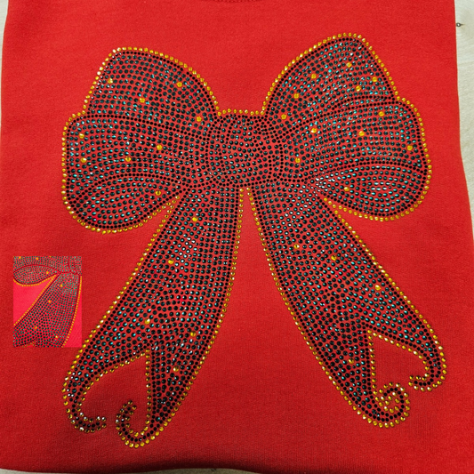 Holiday Bow Rhinestone Transfer on a red tshirt