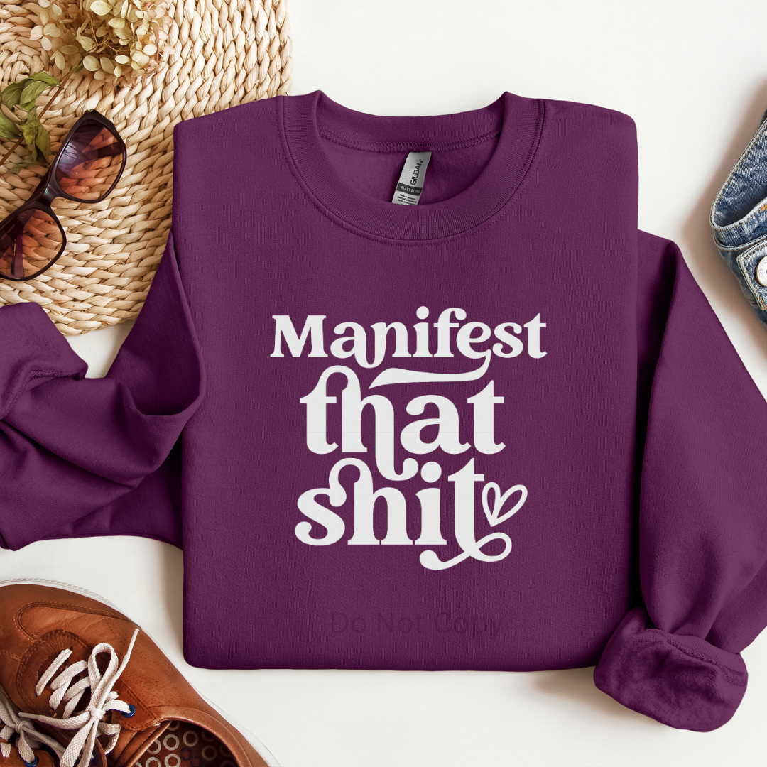 Manifest That Shit White on a tshirt front side
