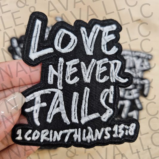 Love Never Fails Hat Patch front side