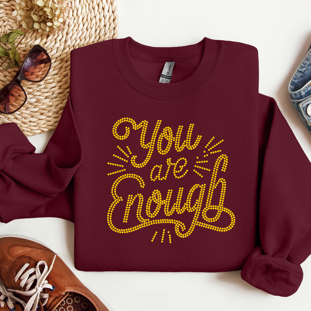 You Are Enough Rhinestone Transfer on a red tshirt